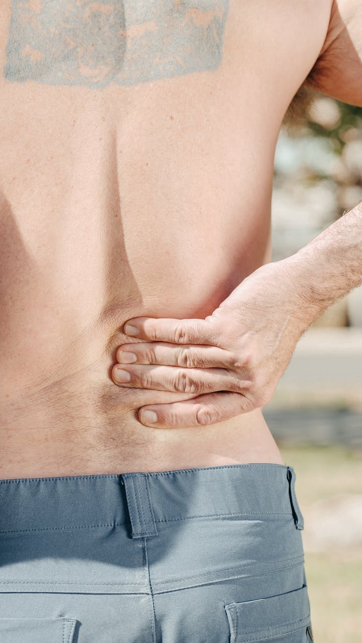 Dr Sanjiv Im having very painful low back .What can I do at home to  deal with the low back pain before seeing you ?When should I immediately come see you for the pain?